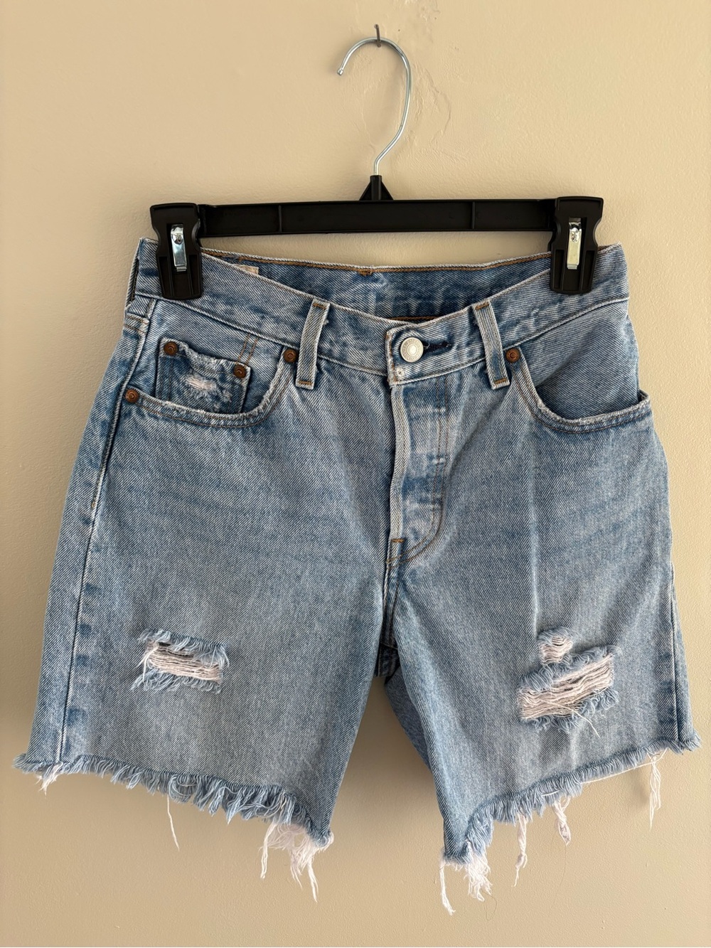Levi’s 501 Mid Thigh Light Blue Distressed Denim Shorts